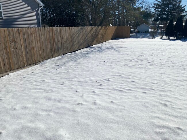 Privacy fence from main road - 5065 Tubbs Rd