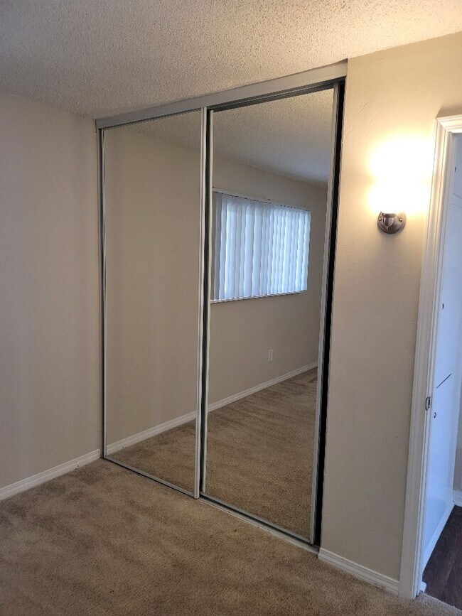 Building Photo - Welcome home to Seabreeze Garden Apartments