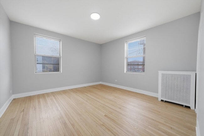 Building Photo - 7520 1/2 N Seeley Ave