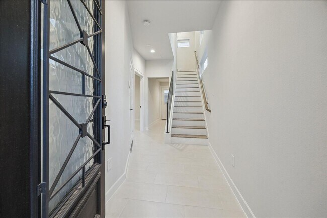 Building Photo - Welcome to this charming property featuring modern amenities and a spacious, open layout. This ho...