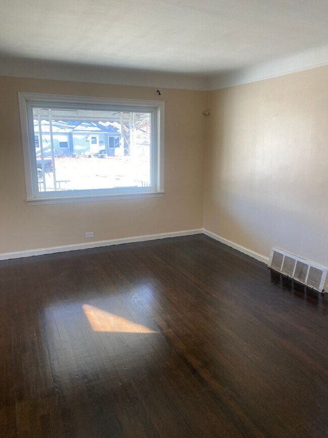 Building Photo - Three bedroom 1 bath bungalow with finished basement and 2 car garage