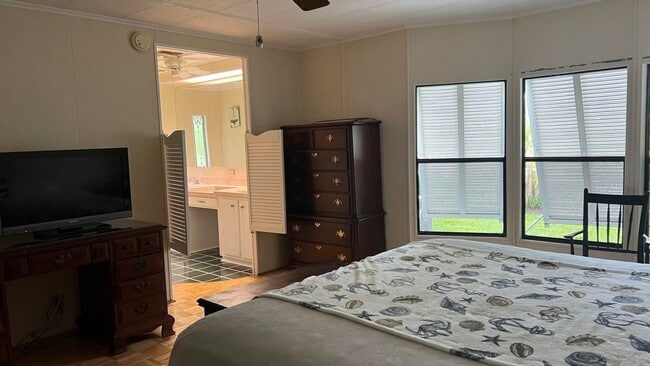 Building Photo - Large 2 Bedroom/2 Bath PALM HARBOR Manufactured Home in Cambridge 55+ Community In Hobe Sound Flo...