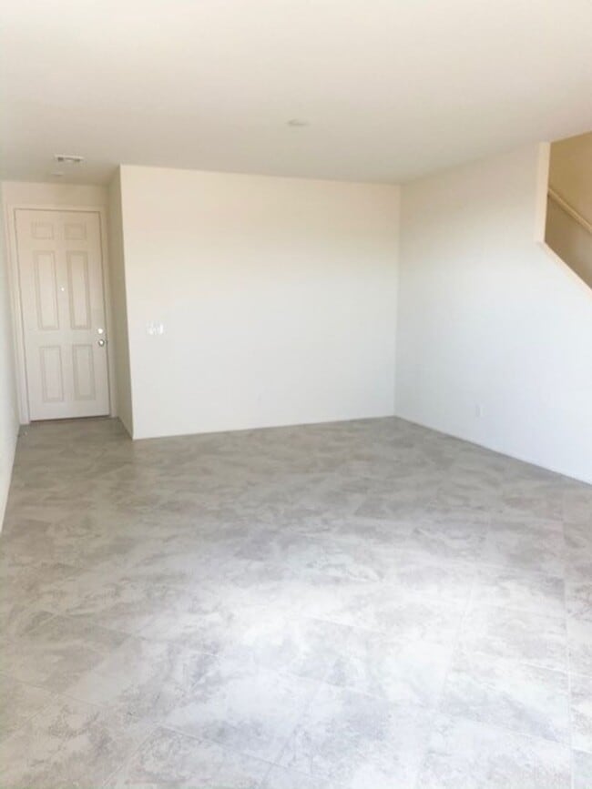 Building Photo - Beautiful Townhome in a Gated Community with 2-Car Garage!!