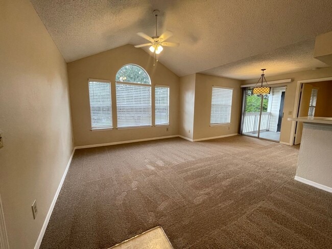 Building Photo - 2br/2ba Tradewinds Condo with Black Applia...