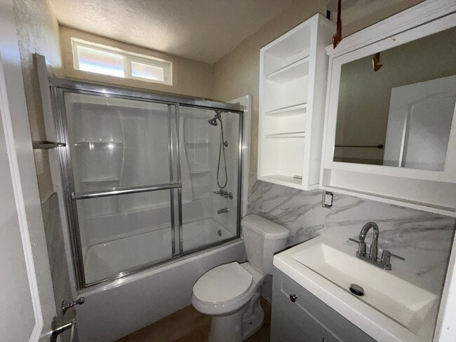 Building Photo - 2 bedroom with outside shed and carport.