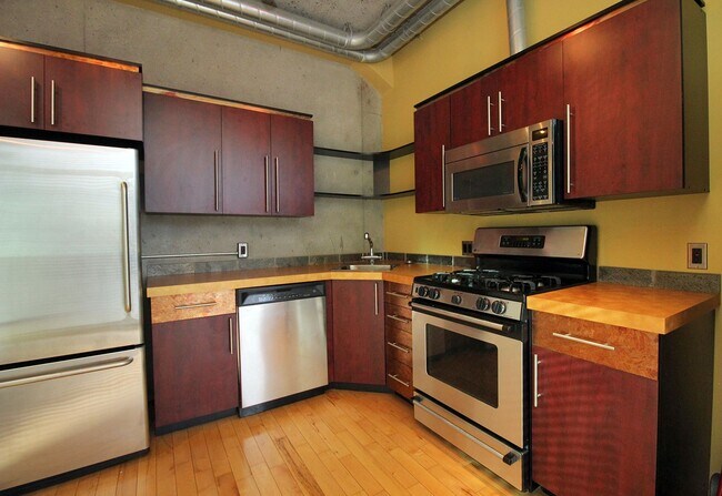 Building Photo - Stylish and Sleek Loft at the Mosaic in Do...