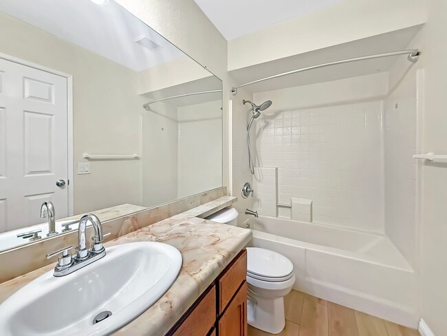 Building Photo - Great 2 bed/2bath condo w/AC, detached garage, and solar!