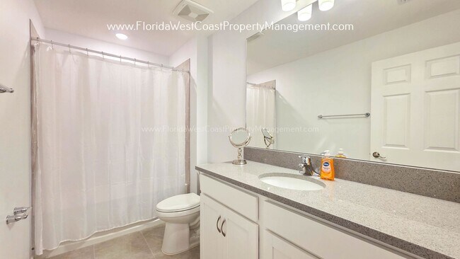 Building Photo - EXCEPTIONAL AND SPACIOUS FURNISHED TOWNHOME WITHIN WATERSIDE- NAUTIQUE!