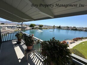 Building Photo - Rent Just Reduced! Premier Sherwood Lakes Location – Upstairs End Unit with Stunning Lake & Mount...