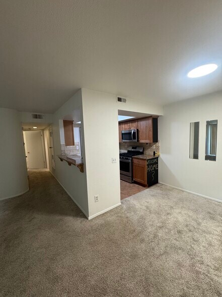 Hallway to bedrooms, kitchen, dining room - 9408 Twin Trails Dr