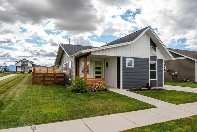 Building Photo - Charming Three Bedroom Home with Large Fenced Yard