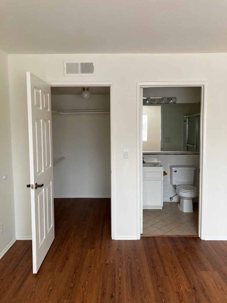 Walk-in Closet, Ensuite Bath - 832 N Hayworth Ave