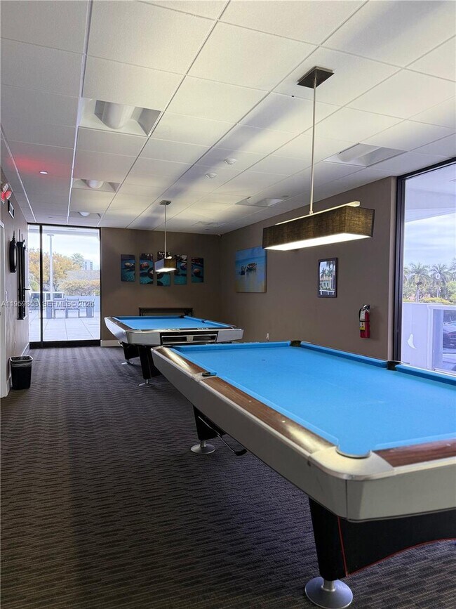 Building Photo - 3675 N Country Club Dr