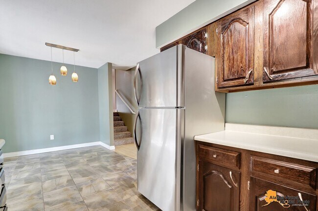 Building Photo - Eagle River Home w/ Fenced Yard, Sunroom, and Garage!