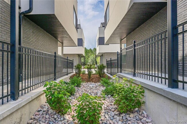 Building Photo - New Construction 3-Bedroom Townhome with Rooftop Deck & Mountain Views