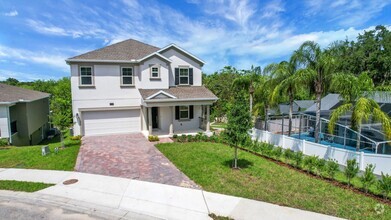 Building Photo - Stunning 4/3 in Gated Dora Parc! Water Views!