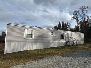 Building Photo - Cute 3/2 Mobile Home in Marianna w/ Lawn Maintenance Included