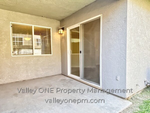 Building Photo - COMING SOON! Private Ground Floor Townhome in Desirable Complex with Attached 2 Car Garage