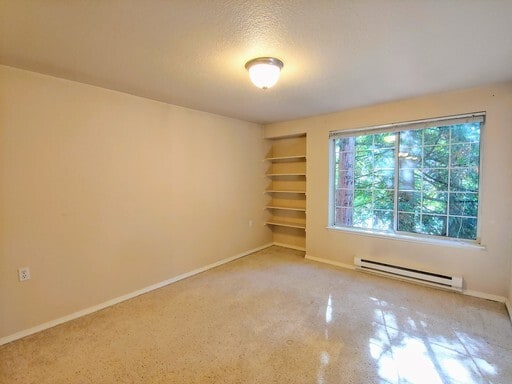 Building Photo - Lovely Condo in the Woods - Deck - Carport - FP - Closets - WD/DW - Fitness Center - Pools