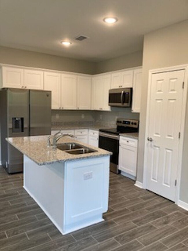Building Photo - Brand New Build- 3 Bedroom 2.5 bath townhome.