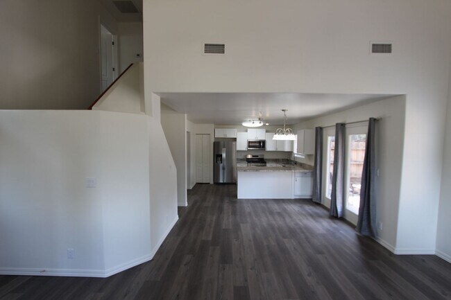 Building Photo - Remodeled End-Unit Townhome @ Village at Elk Run | 3 Bed, 2.5 Bath + 2-Car Garage