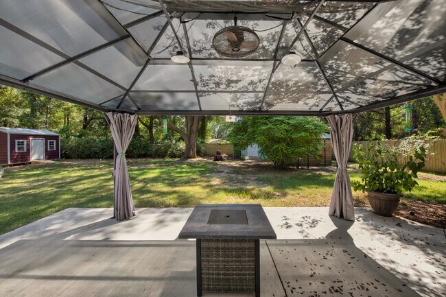 Building Photo - Pace 3BR Home with Bonus Room, Patio Gazeb...