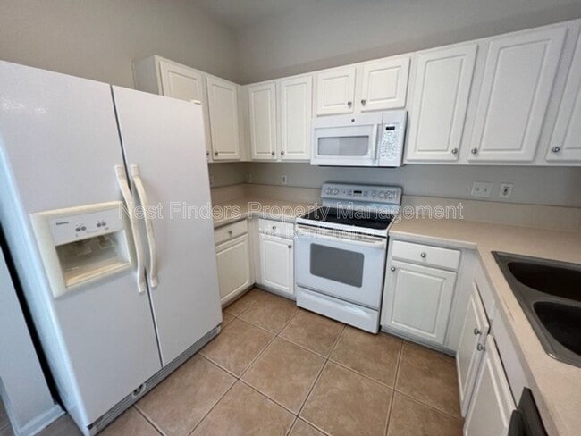 Building Photo - 7499 Scarlet Ibis Ln