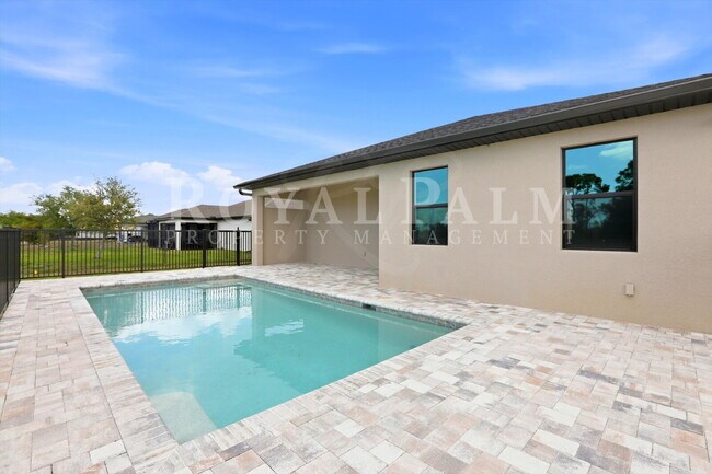 Building Photo - 3BR/2BA New Construction with Pool, Fence & Garage — Built Yesterday, Ready Today - Cape Coral