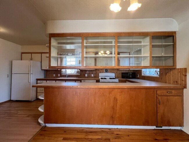 Building Photo - Bi-Level House w/ Massive Backyard, Storage, & Character!