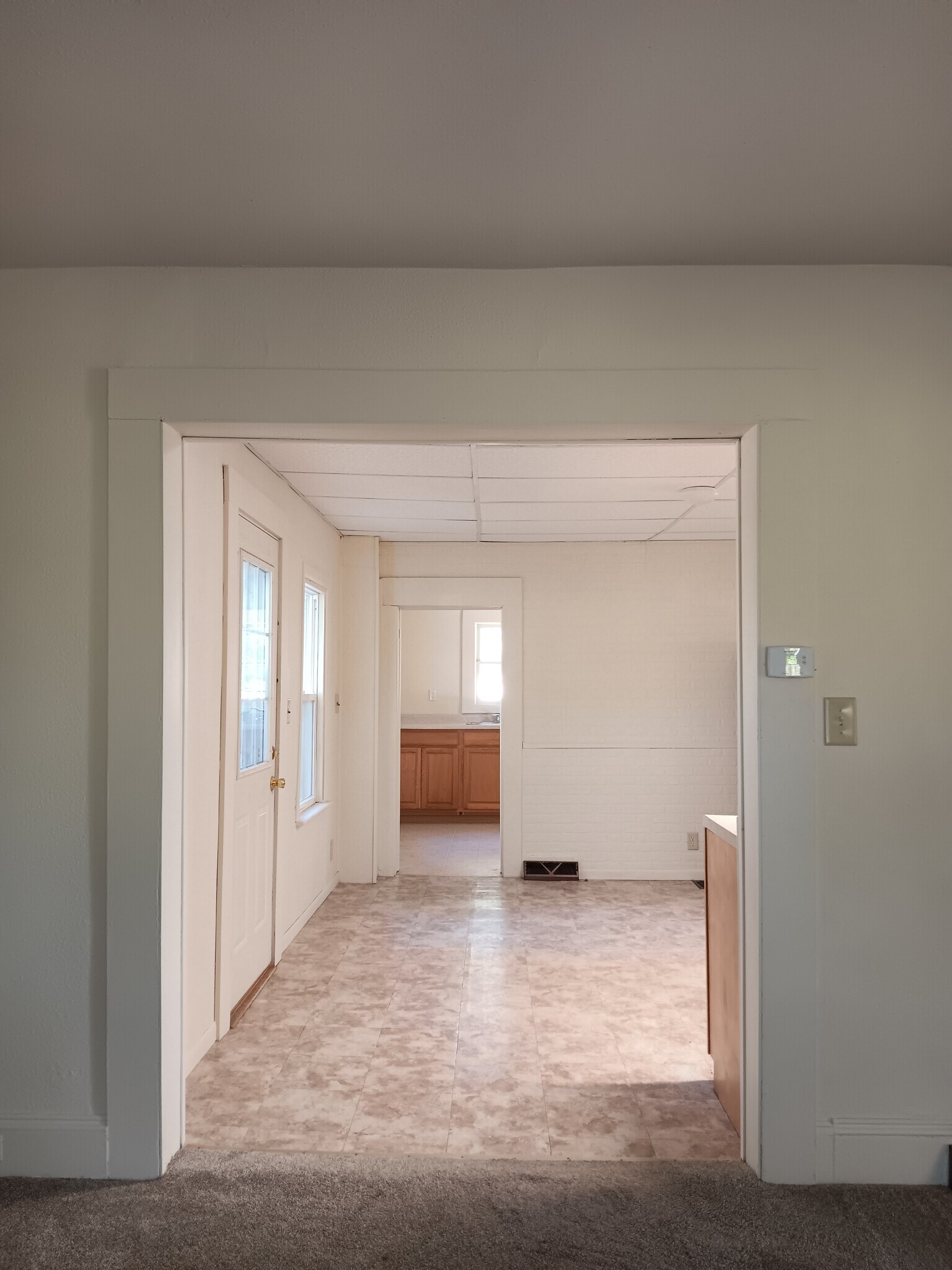 Kitchen, utility room from living room - 2313 Kane Rd