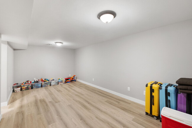 Basement Recreation/play room - 318 Highland Dr