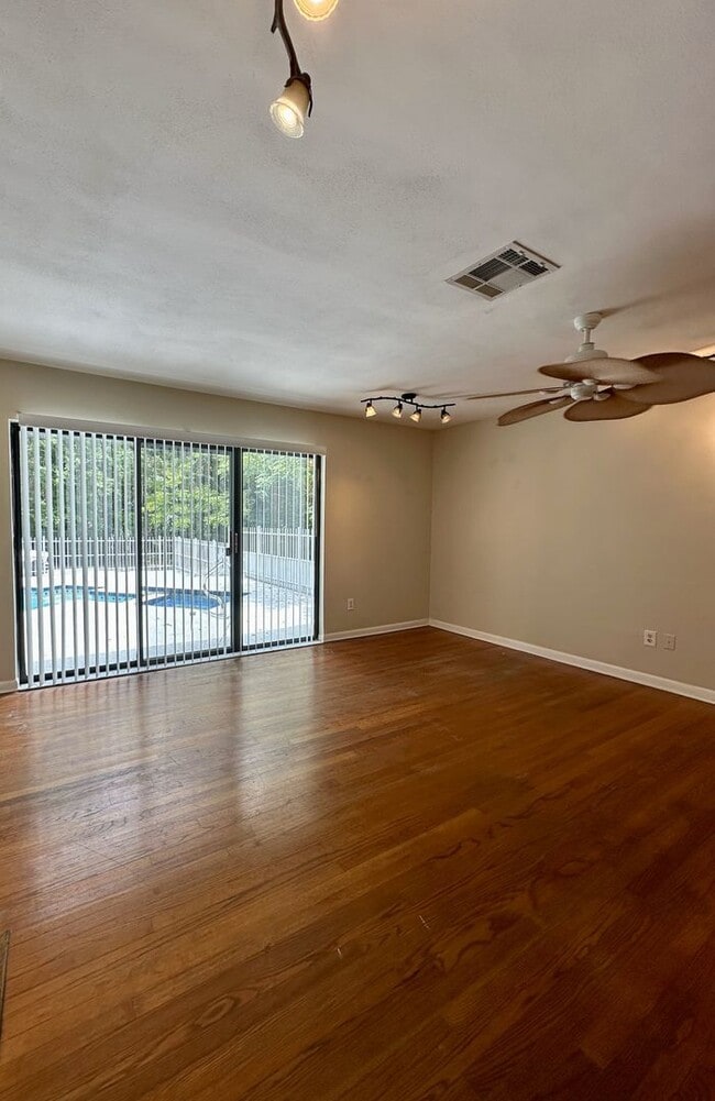 Building Photo - Upgraded 4BR/3.5BA Pool Home in Prestigiou...