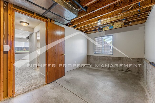 Building Photo - Spacious Home with Fenced Yard and Central AC