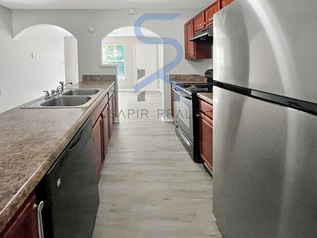 Building Photo - Move in before October 15th and get $100 O...