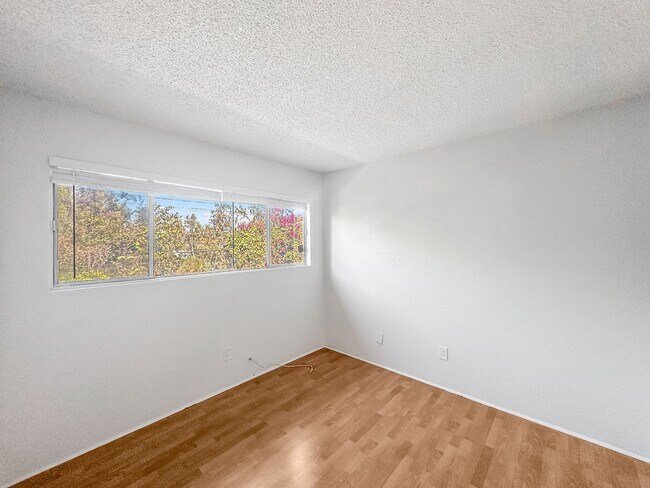 Building Photo - SD: Comfortable 2BD/2BA Condo in Chula Vista with Covered Patio & 2 Parking Spaces