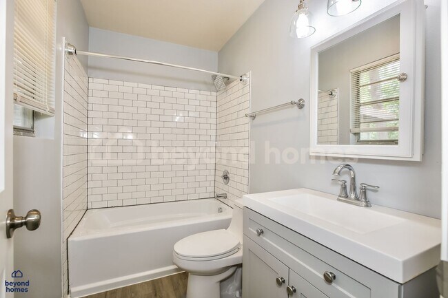 Building Photo - Charming 3 BR Brick Home with Upgraded Kitchen, Stone Fireplace & Sunroom in Little Rock