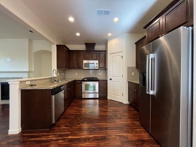 Building Photo - 3BD/3BA Bethany Home with Vaulted Ceilings, Stainless Appliances & Gas Fireplace