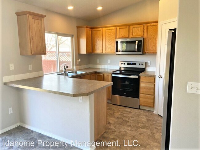 Building Photo - 4 br, 2.5 bath House - 610 E Blue Heron St
