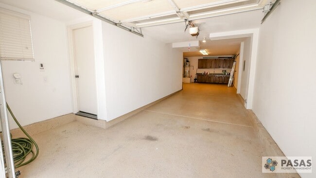 Building Photo - Modern Corner-Unit Condo with tandem 2-Car Garage in Central San Diego