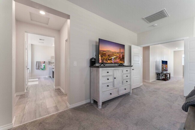 Building Photo - Modern Luxury Living: Spacious Retreat with Next-Gen Suite!