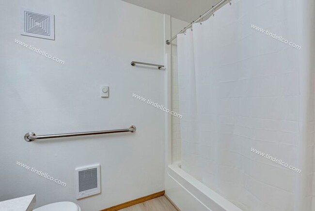 Building Photo - Spacious Pet-Friendly Ground Level Unit w/...