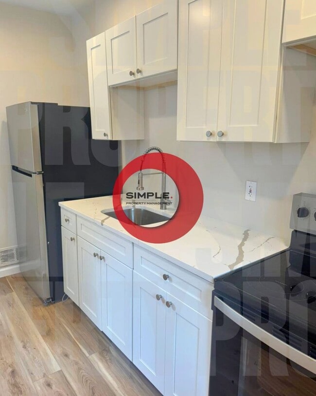 Primary Photo - Two-bedroom one bath house with off street...