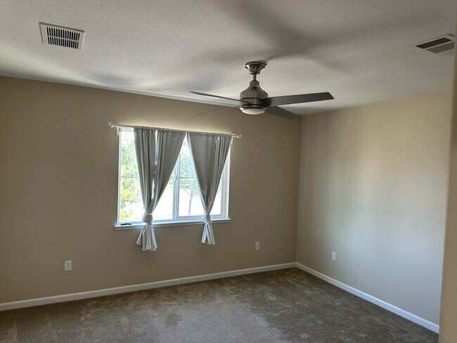 Building Photo - This stunning corner home offers 4 spaciou...