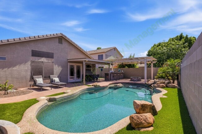 Building Photo - Resort-Style Gilbert Living with Private Pool & Outdoor Kitchen!