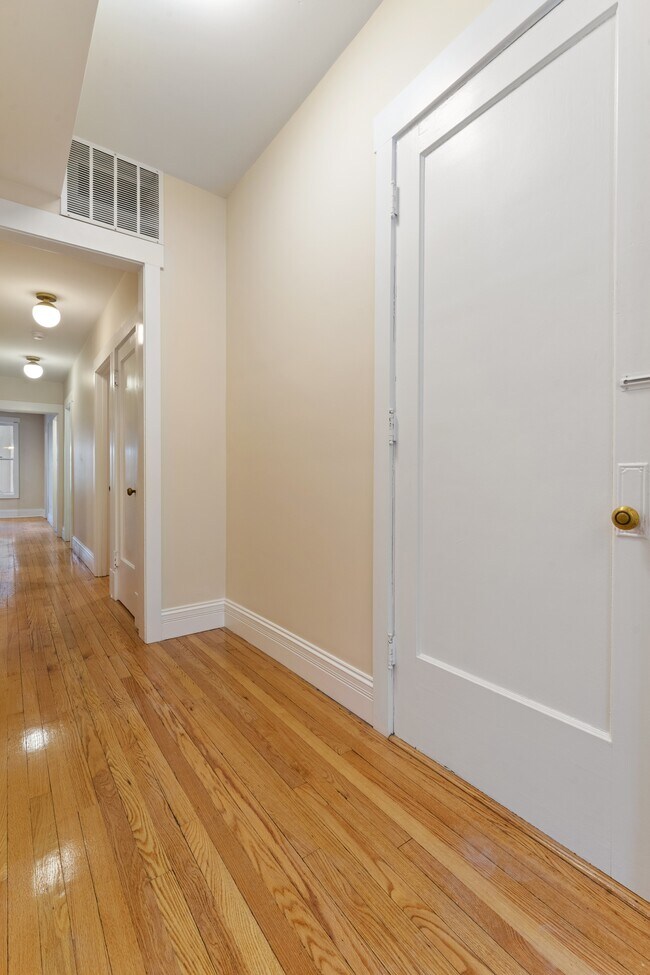 Entry Way and Hallway to Bedrooms and Kitchen - 6444 N Magnolia Ave