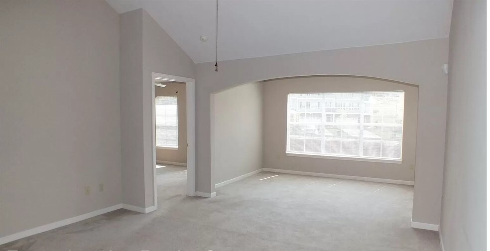 Living room and sunroom - 604 Bristol Village Dr