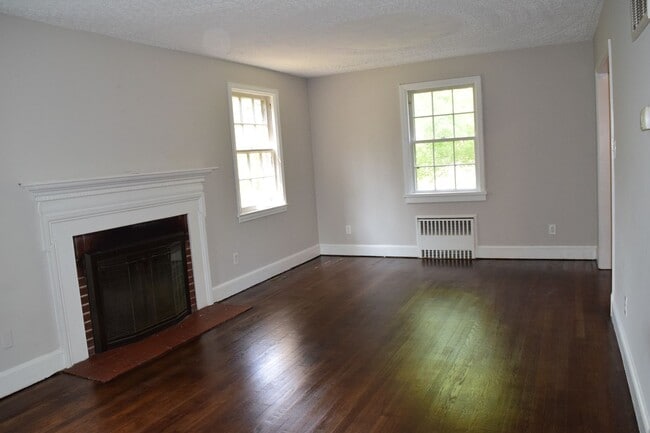 Building Photo - Charming Northside Two-Story Brick Home With 2 car garage and basement