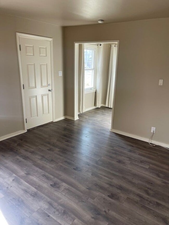 Building Photo - Charming 1-Bedroom Oasis with Modern Upgrades & Spacious Yard!