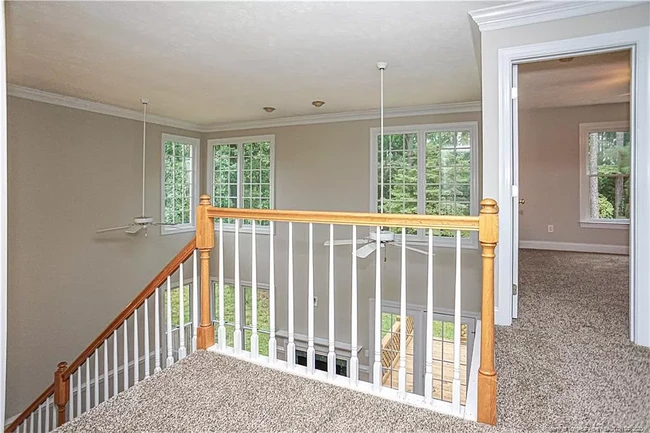 Family room windows and bedroom 1 - view from 2nd floor landing - 1977 Culpepper Ln