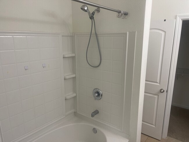 Building Photo - Enjoy Stylish Townhome Living in Vibrant B...